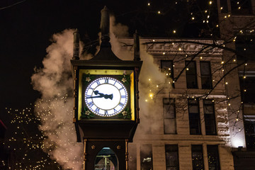 Close up of Steam Clock in Gastown, Vancouver, Canada at Night time. It's Gastown's most famous...