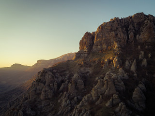 Fototapeta na wymiar Demerdzhi mountain range in the rays of the setting sun. Autonomous Republic of Crimea