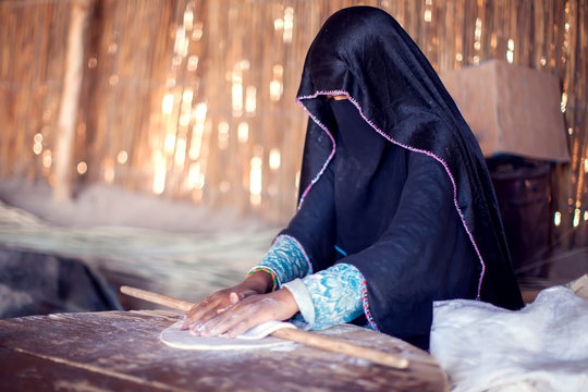 Arab Woman Makes Bread In The Beduin Village In Egypt