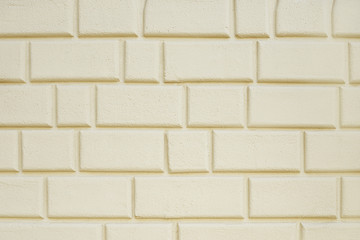 Old beige stone wall background texture