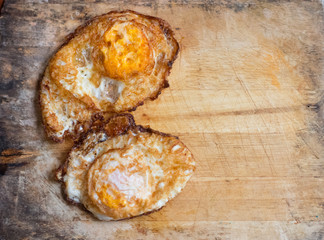 egg fried on woodden top view