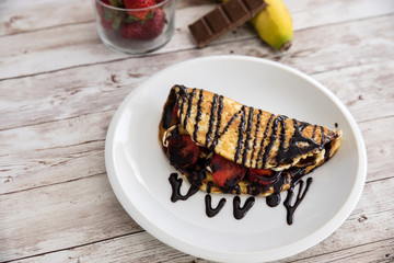 Strawberry Banana Crepe with Chocolate syrup