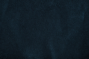 Close up of natural black suede leather background