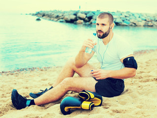 man resting after strenuous training