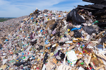 Mountain large garbage pile and pollution,Pile of stink and toxic residue,These garbage come from urban and industrial areas can not get rid of, Consumer society Cause massive waste