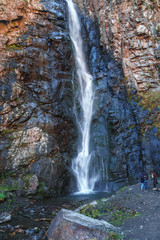 Gveleti Big Waterfalls in a Dariali Gorge near the Kazbegi city in the mountains of the Caucasus, Geprgia