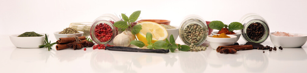 Spices and herbs on table. Food and cuisine ingredients with basil