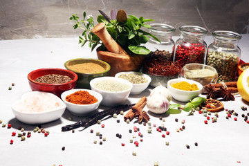 Spices and herbs on table. Food and cuisine ingredients with basil