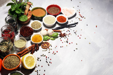 Spices and herbs on table. Food and cuisine ingredients with basil
