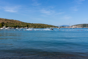 Fototapeta premium Panorama of the beach with recreation yachts on Turkish resort, Bodrum, Turkey