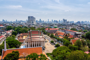 Fototapeta premium Skyline of Bangkok downtown with old traditional buildings in front, Thailand