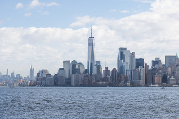 View of Manhattan buildings and river from Brooklyn neighborhood, New York.