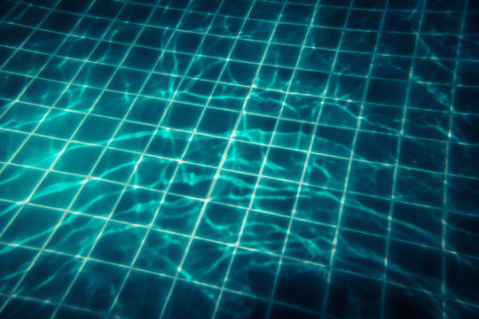 Swimming pool water background with transparent turquoise water and net pattern in vintage style