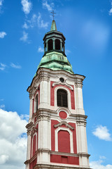 Fototapeta na wymiar belfry of the baroque, historic church in Poznan