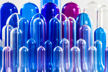 The various type of plastic bottle product and preform material with white background