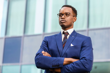 Outdoor standing portrait of a black African American business man