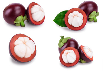 ripe mangosteen with leaves isolated on white background closeup. Set or collection