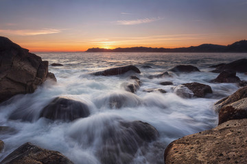 Fototapeta premium Water splash over the rocks in Bermeo, Spain