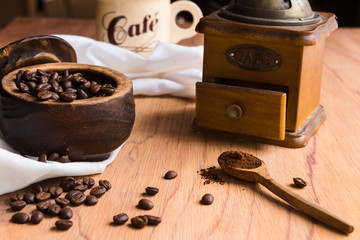  Coffee cup, grinder and beautiful coffee beans