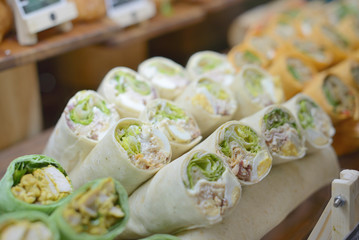 light lunch sliced wraps on the counter of the cafe