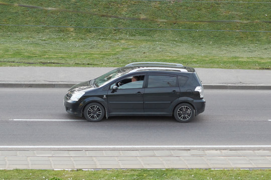 Passenger car black in the city