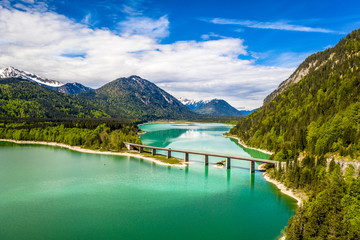 4K Drone Amazing bridge over accumulation lake Sylvenstein, upper Bavaria. Aerial view. May, Germany