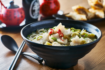 spicy chinese fish soup in bowl