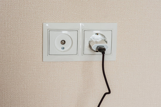 adapter for smartphone charging in on socket wall