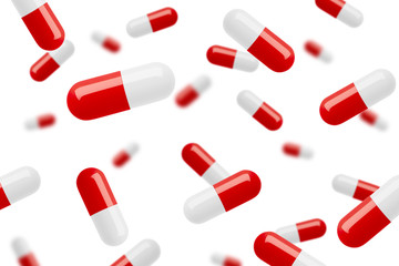 Falling pills, isolated on white background, selective focus