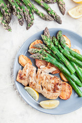 Fried cod fillet with green asparagus