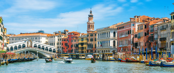 Panorama of Grand Canal, Venice, Italy. Rialto Bridge and colorful houses on sunny day. © scaliger