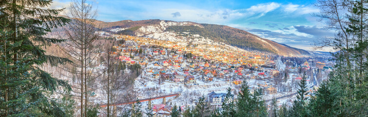 Obraz premium Winter landscape, panorama, banner - top view of the city Yaremche in the Carpathians Mountains valley, in Ukraine