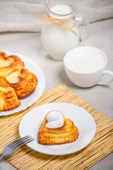 Cheese curd dish for breakfast - sweet cottage cheese pancakes, syrniki, curd fritters, selective focus