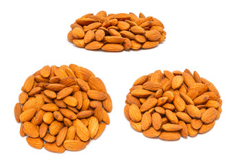 Set of handfuls of nuts from different angles - almond seeds (Prunus dulcis) without shell, close up, isolated on white background