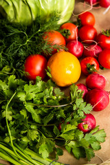 Healthy food background. Assortment of fresh vegetables on paper background
