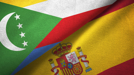 Comoros and Spain two flags textile cloth, fabric texture
