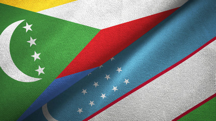 Comoros and Uzbekistan two flags textile cloth, fabric texture