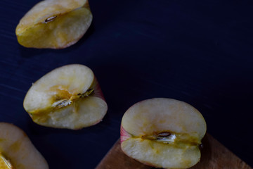 Fresh apple isolated on black table