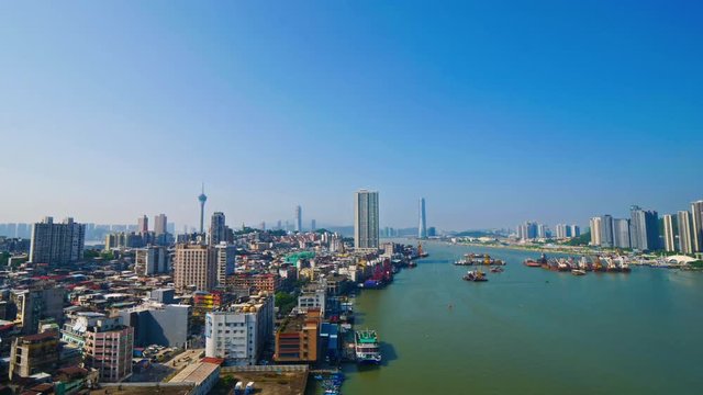 Cityscape Timelapse of Macao China Bay With City Road and Boat Traffic Buildings and Convention Entertainment Centre Tower