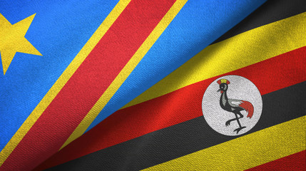 Fototapeta premium Congo Democratic Republic and Uganda two flags textile cloth, fabric texture
