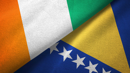 Cote d'Ivoire and Bosnia and Herzegovina two flags textile cloth, fabric texture 