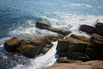 Waves Along Ocean Path Cliff, Acadia National Park, Bar Harbor Maine. Walking path along the ocean. Lots of rock formations, plants, waves and wildlife along this beautiful path.