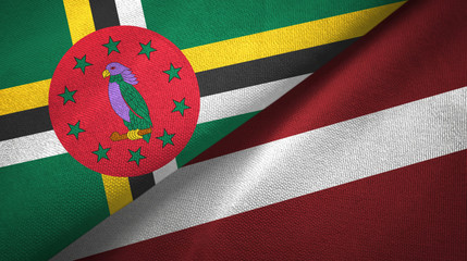 Dominica and Latvia two flags textile cloth, fabric texture