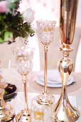 Wedding decoration. Flowers and candles.