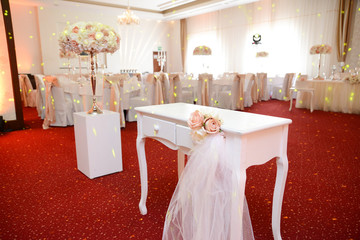 Wedding decoration. Flowers and candles.
