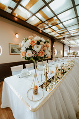 Wedding decoration. Flowers and candles.