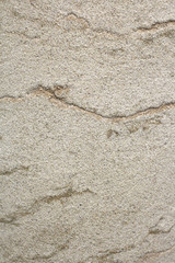 Fototapeta na wymiar Rough surface texture background Sandstone exotic stone cut from rock layer sand, desert sand