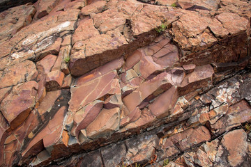 Large Rocks with Striations and Grooves on the Shore Path Bar Harbor Maine Unique rocks with interesting and intricate textures. Beautiful path along the Atlantic ocean featuring all types of rocks.