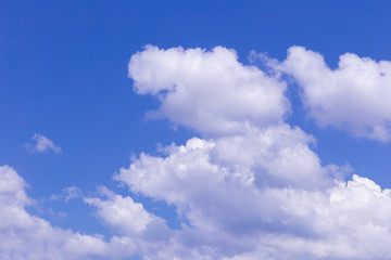 Blue sky and white clouds, rain clouds on sunny summer or spring day.