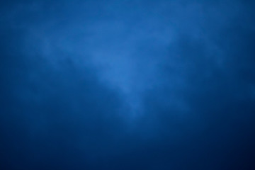 Fototapeta premium Stormy abstract blue background. Moody, cloudy feel. Texture.
